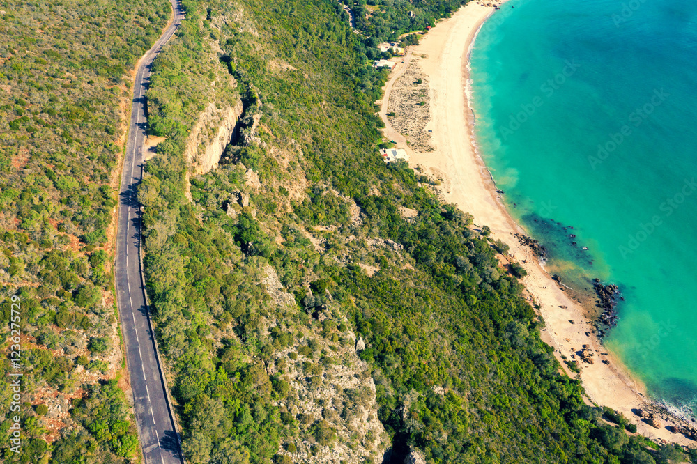 Panoramic aerial view of Arrabida beach. Rocky seascape. Creiro beach. Setubal region, Atlantic Ocean, Portugal