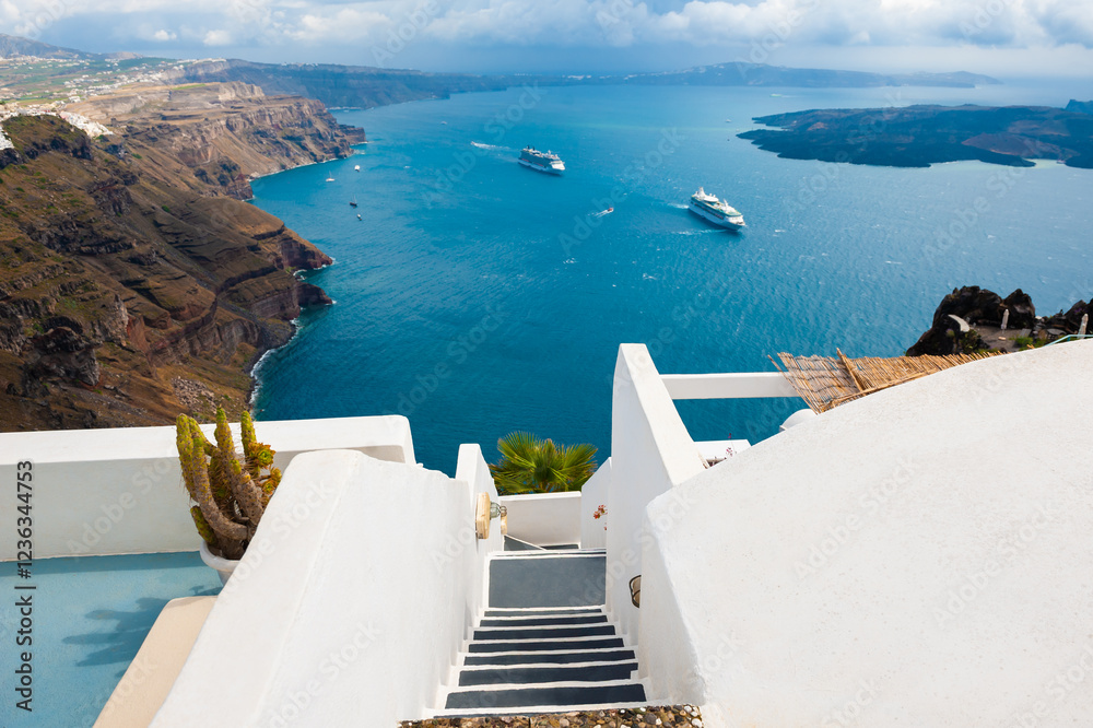 Santorini island, Greece. Rainy clouds over the island.