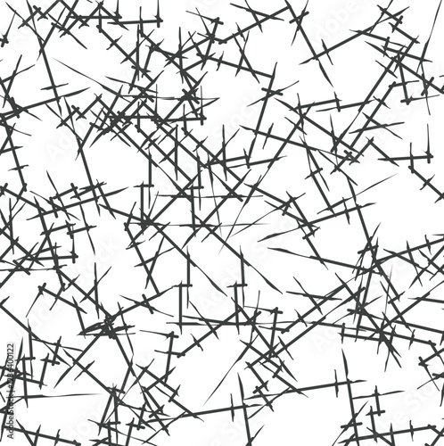A texture that resembles tangled wire or branches with thorns or sharp ends.