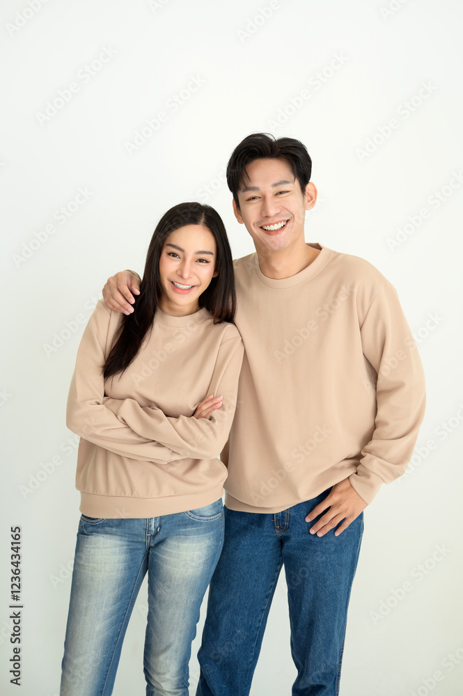 Couple Smiling Together in Matching Outfits, Showcasing a Warm and Friendly Atmosphere at Home Couple Smiling Together in Matching Outfits, Showcasing a Warm and Friendly Atmosphere at Home