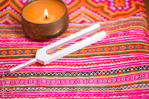 tuning fork on a fabric.