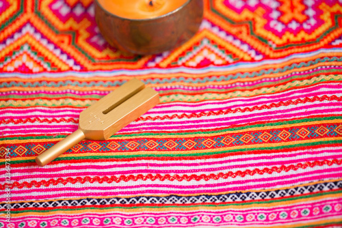 tuning fork on a fabric.