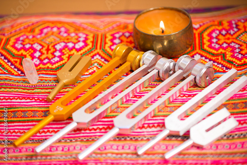 tuning fork on a fabric.