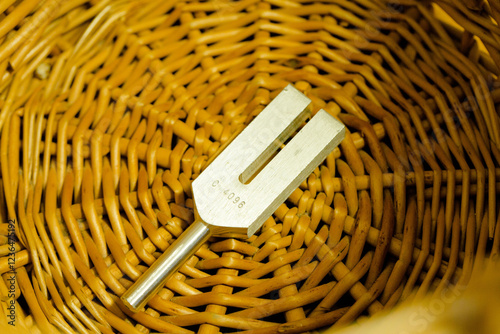 tuning fork on a fabric.