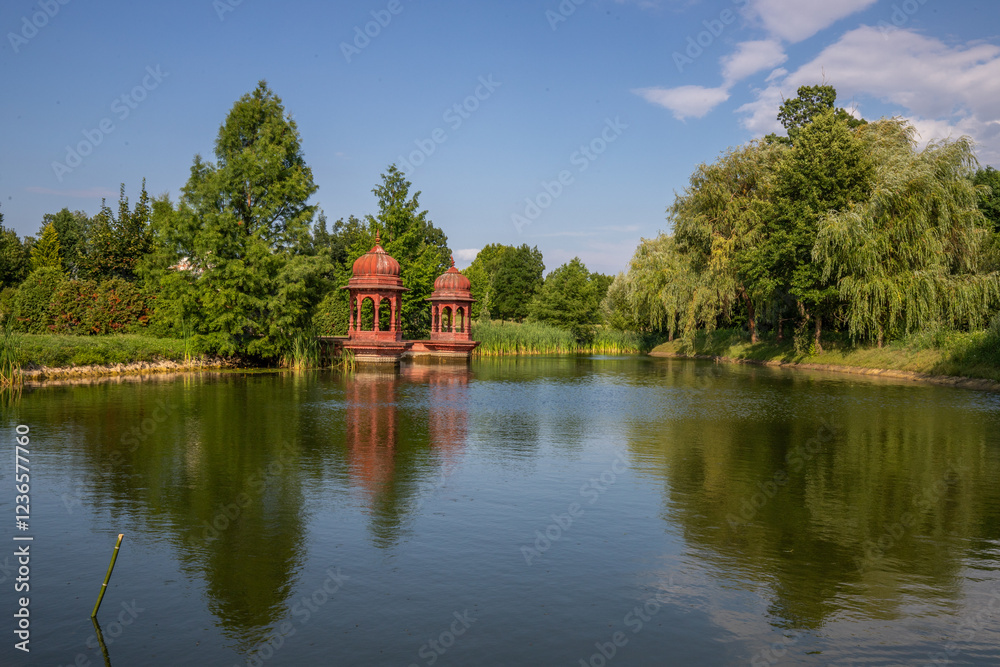 Beautiful summer evening in a park. Landscape shot in Krishna valley at sunset. Park and temple complex at Balaton, Unagrn Beautiful summer evening in a park. Landscape shot in Krishna valley at sunset. Park and temple complex at Balaton, Unagrn
