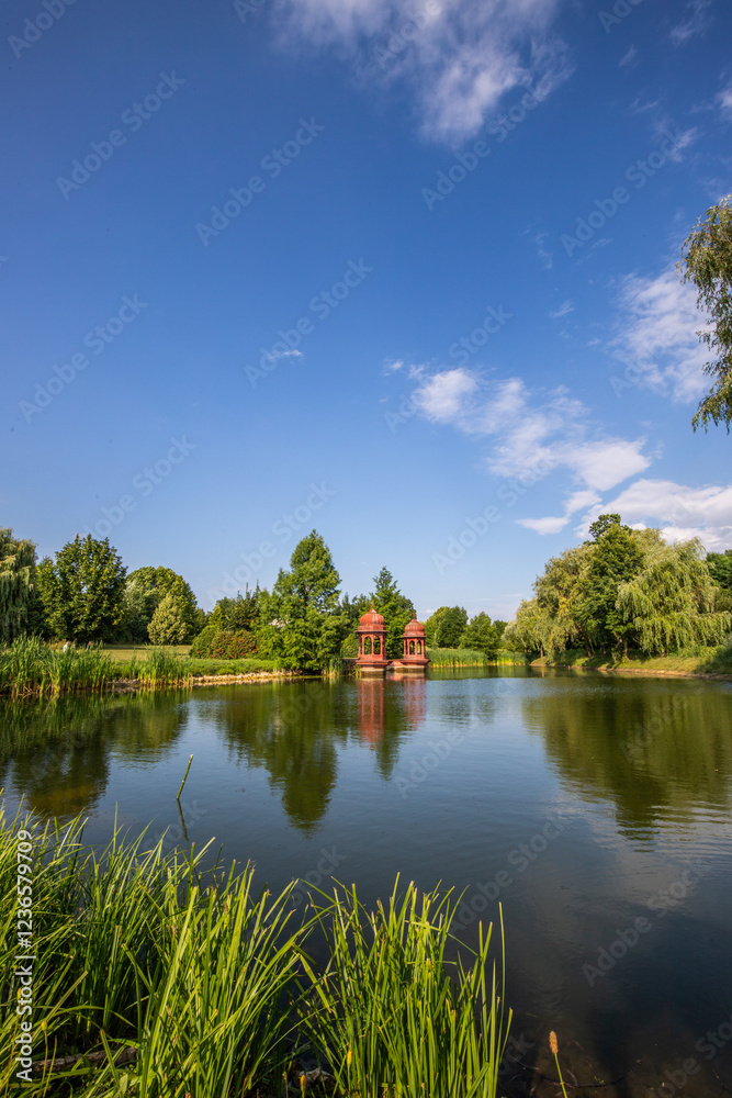 Beautiful summer evening in a park. Landscape shot in Krishna valley at sunset. Park and temple complex at Balaton, Unagrn Beautiful summer evening in a park. Landscape shot in Krishna valley at sunset. Park and temple complex at Balaton, Unagrn