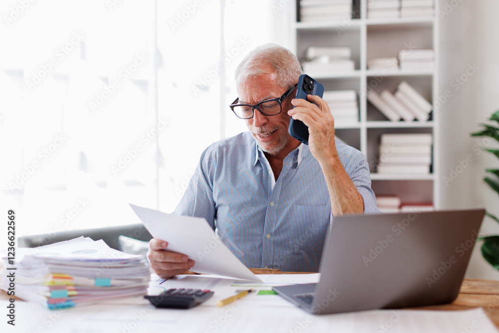 Portrait of around the age of 55s, making telephone call share good news about project working in office workplace, man planning finance concept. Portrait of around the age of 55s, making telephone call share good news about project working in office workplace, man planning finance concept.