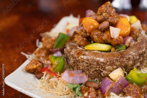 Close-up view of the sweet and sour pork cuisine.