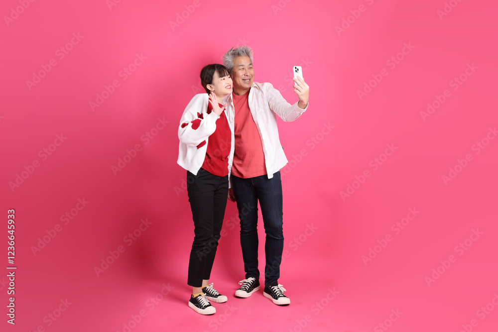 man and woman in red clothes