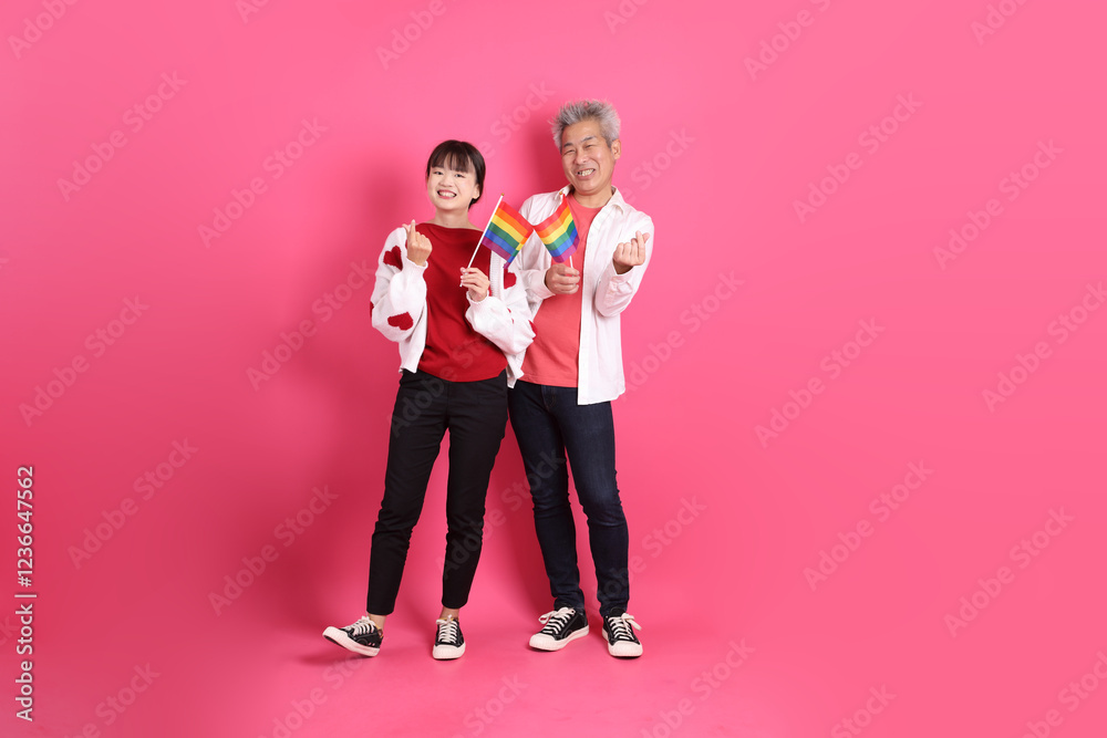 man and woman in red clothes man and woman in red clothes