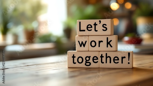 Wooden blocks with words 'Let's work together'. Business concept photo