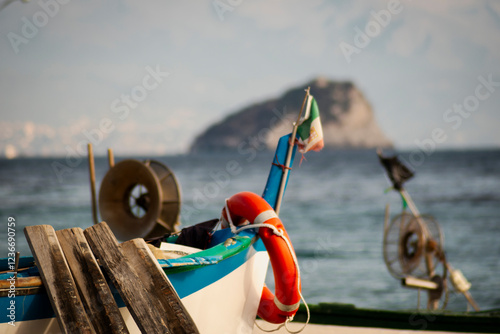 Fototapeta Naklejka Na Ścianę i Meble -  Liguria, Italy. The fishing boats on the beach of the old village of Noli.