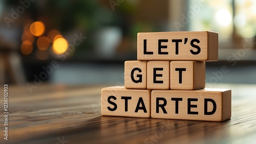 Wooden blocks with words 'Let's get started'.
