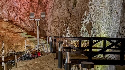 Scenic view of an illuminated cave interior with stalactites, perfect for travel and exploration themes  stopica pecina  Stopica cave photo