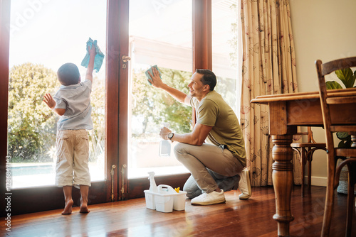 Фотография Home, father and child with cleaning windows for household chores, helping and teaching responsibility