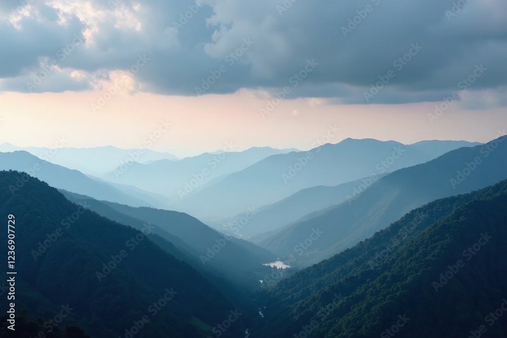 Obraz premium Foggy mountain landscape with misty smoke and dark grey clouds, mountains, clouds