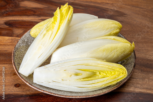 Fresh organic chicory endive salad ready to eat, traditional winter food in Belgium and the Netherlands