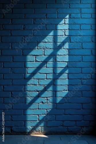 Dusky blue brick wall with a deep window shadow at dusk, #softfocus, #windowilluminated, #duskyblue photo