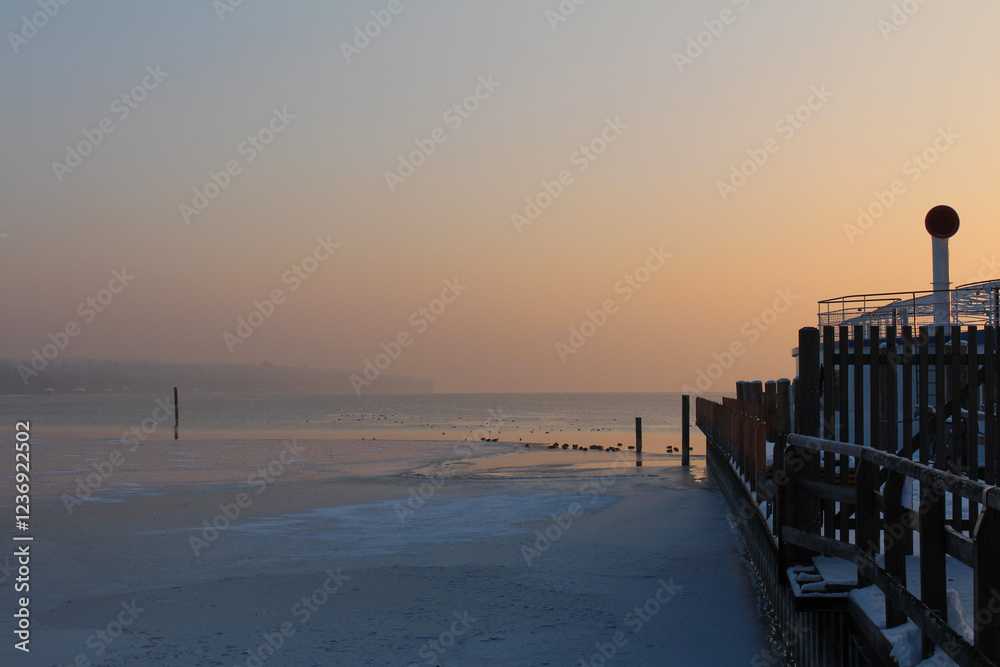 frozen lake during sunset. frozen lake during sunset.