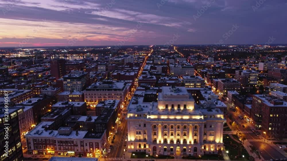 A breathtaking 4K ultra-HD aerial stock video capturing a panoramic view of the Providence skyline at dusk, as the city transitions from day to night. A breathtaking 4K ultra-HD aerial stock video capturing a panoramic view of the Providence skyline at dusk, as the city transitions from day to night.