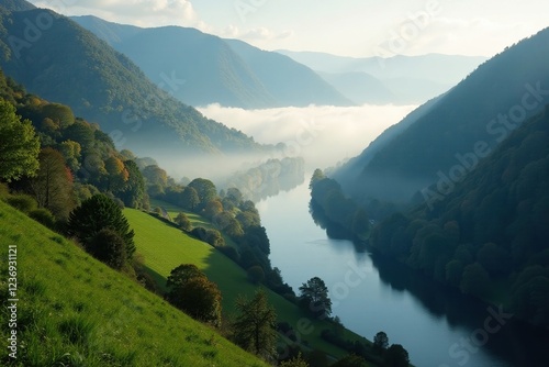 Misting fog in the valley of Bernkastel Kues Mosel river, water fog, rolling hills photo