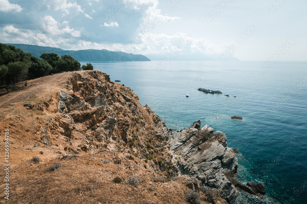 Scenic Coastal Cliffs Overlooking Calm Sea Scenic Coastal Cliffs Overlooking Calm Sea