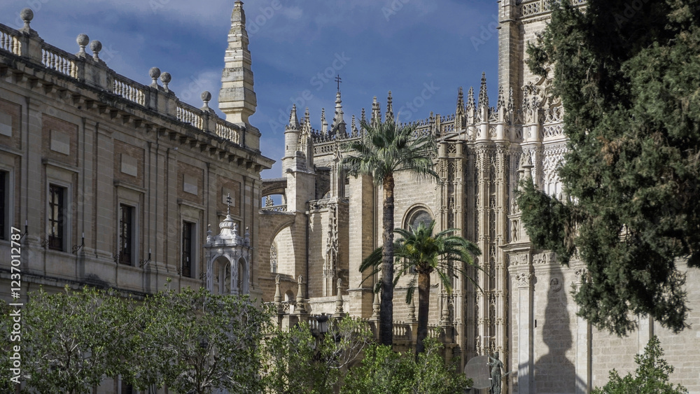 A lively city scene with historic architecture, palm trees, and people walking. The cathedral's intricate details and bright sky create a vibrant and charming atmosphere.
A lively city scene with historic architecture, palm trees, and people walking. The cathedral's intricate details and bright sky create a vibrant and charming atmosphere.