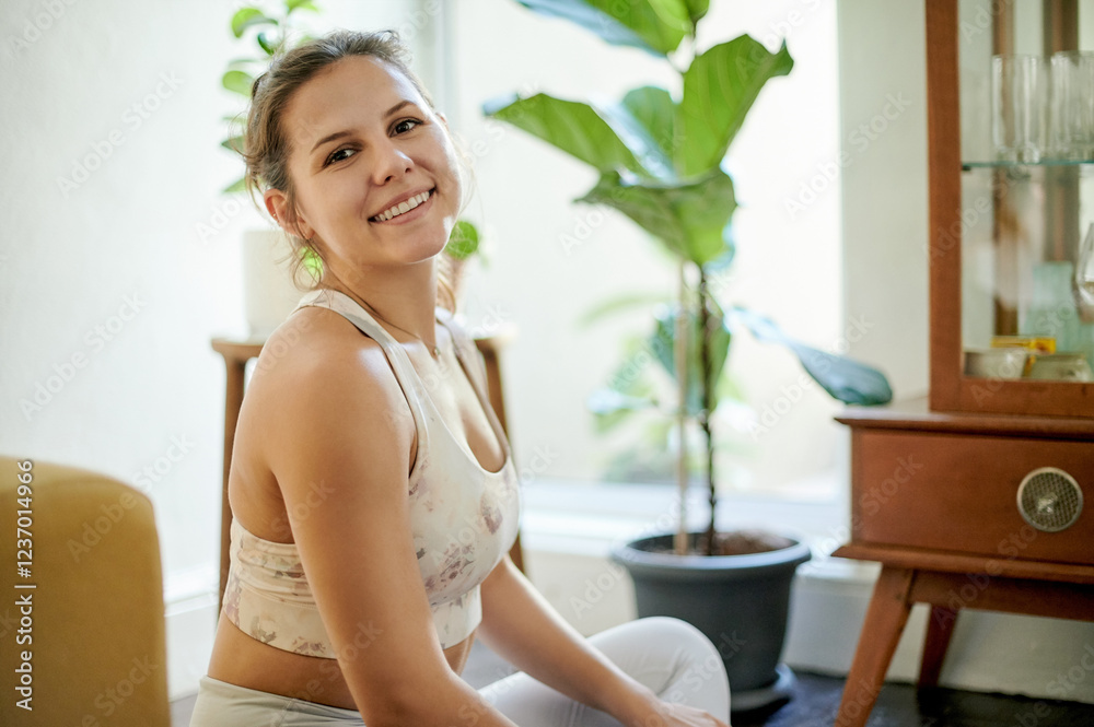 Yoga, portrait and happy woman at home doing warm up and pilates training with a smile. Wellness, fitness and exercise of a relax young person in house with spiritual practice for workout and health Yoga, portrait and happy woman at home doing warm up and pilates training with a smile. Wellness, fitness and exercise of a relax young person in house with spiritual practice for workout and health