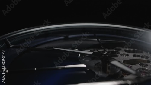 Close Up Wide Angle Shot Of Stylish Luxury Man Wrist Watch With Open Skeleton Mechanism. Second Arrow Running. Light Slides Across the Watch Face