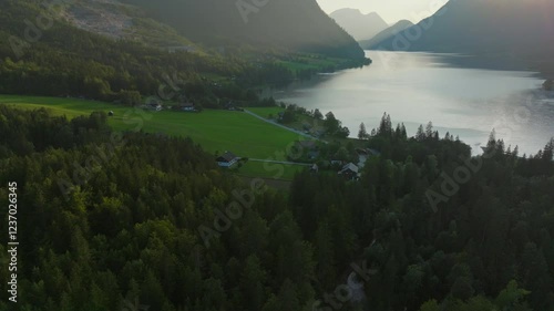 Grundslee - beautiful clean lake - surrounded by mountains - 4K aerial shot 