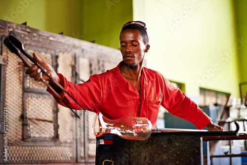 Fotografie Glass, art and black man in workshop with tools for small business, craft or handmade technique