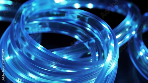 Discover the mesmerizing glow of illuminating blue rings in a dark environment