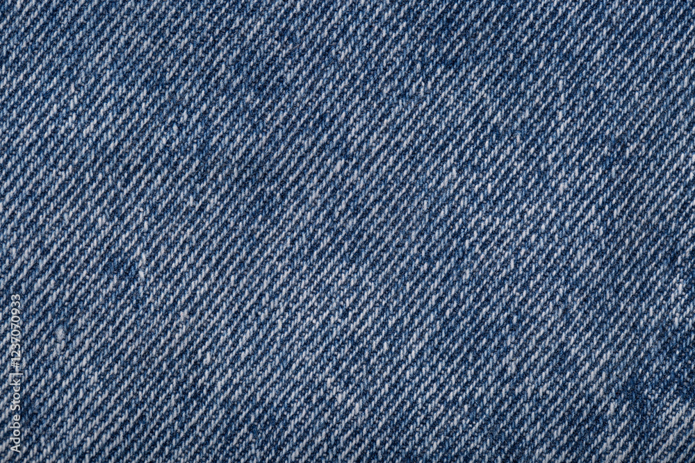 The denim is light blue. Denim background. The denim is light blue. Denim background.