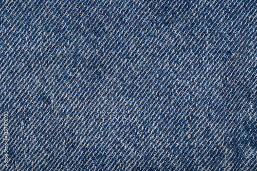 The denim is light blue. Denim background.