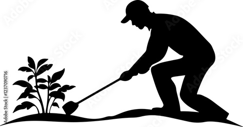 Silhouette of Man Digging in the Garden
