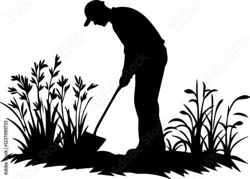 Silhouette of Man Digging in the Garden
