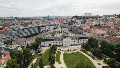 Photography Grassalkovich Presidential Palace and Bratislava cityscape view on a cloudy day