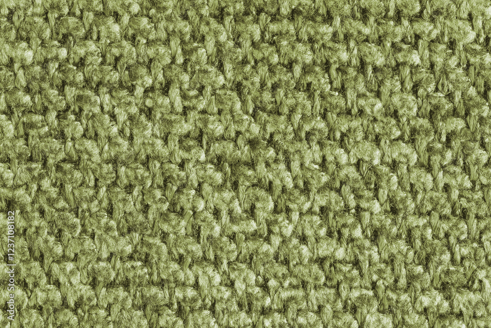 Fototapeta premium Texture of khaki jacquard fabric, close up of rough weave macro. Material for home textile, upholstery and curtain decor, garment. Background, wallpaper, backdrop.