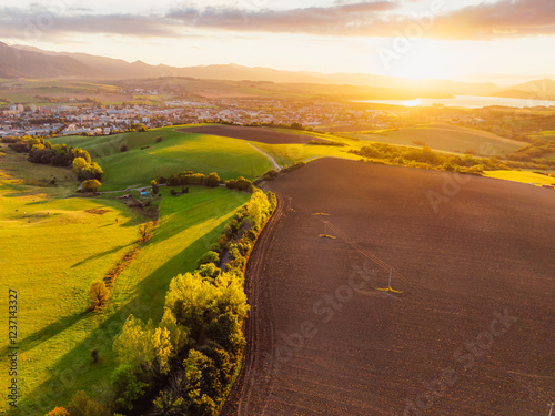 Sunset over Liptov region with Liptovska Mara lake and Tatras mountains around. Liptovsky mikulas landspace, slovakia. photo