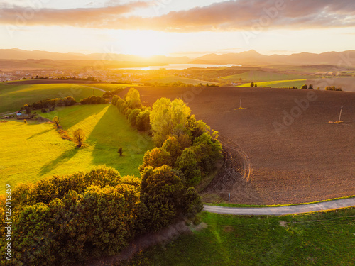 Sunset over Liptov region with Liptovska Mara lake and Tatras mountains around. Liptovsky mikulas landspace, slovakia. photo