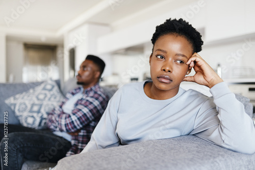 Angry, black couple and fight with stress at house of marriage conflict, bad communication and drama. People, thinking and relationship risk for divorce argument, cheating mistake and toxic betrayal