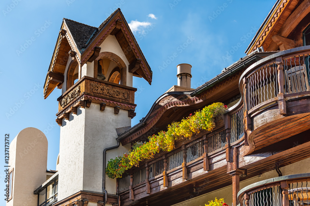 Φωτογραφία Vail, Colorado ski resort town village with blue sky and wooden tower of lodge h