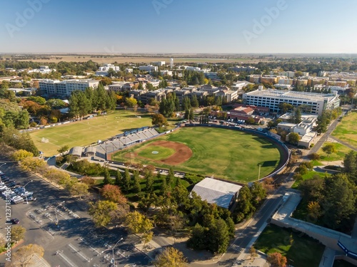 Aerial view of a UC Davis campus with sports fields, including a baseball diamond and soccer field. Students and faculty likely utilize the facilities.  Davis, California, USA