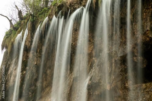 Plitvice Lakes National Park in Croatia, beautiful lakes and waterfalls between the green forest 