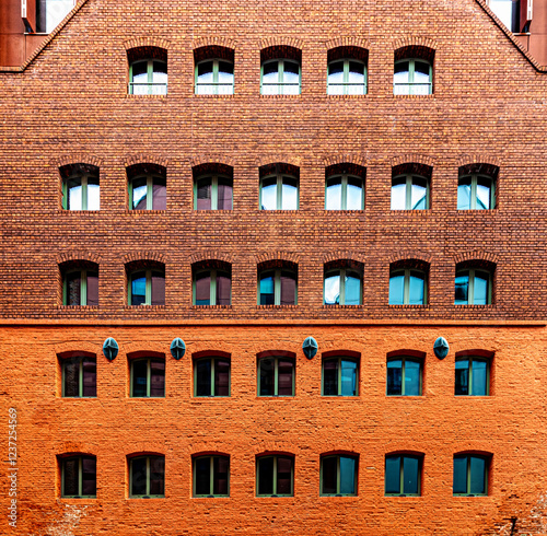 Modern residential house construction in a brick gothic style photo