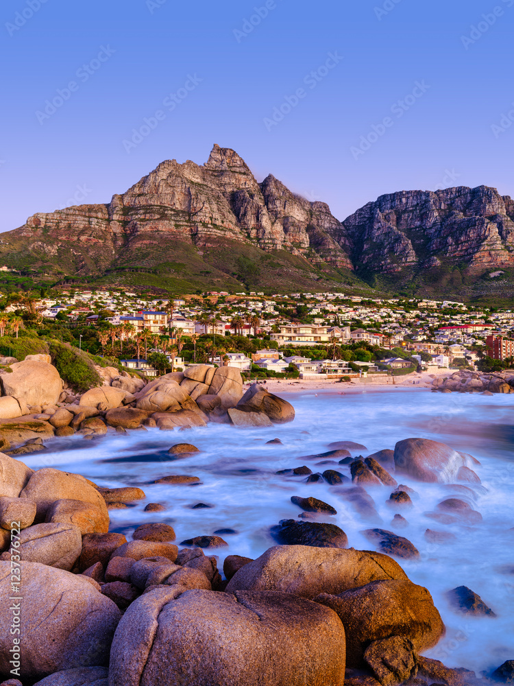 Long Exposure Shot of Camps Bay During Twilight at Sunset from Maiden's Cove, Cape Town