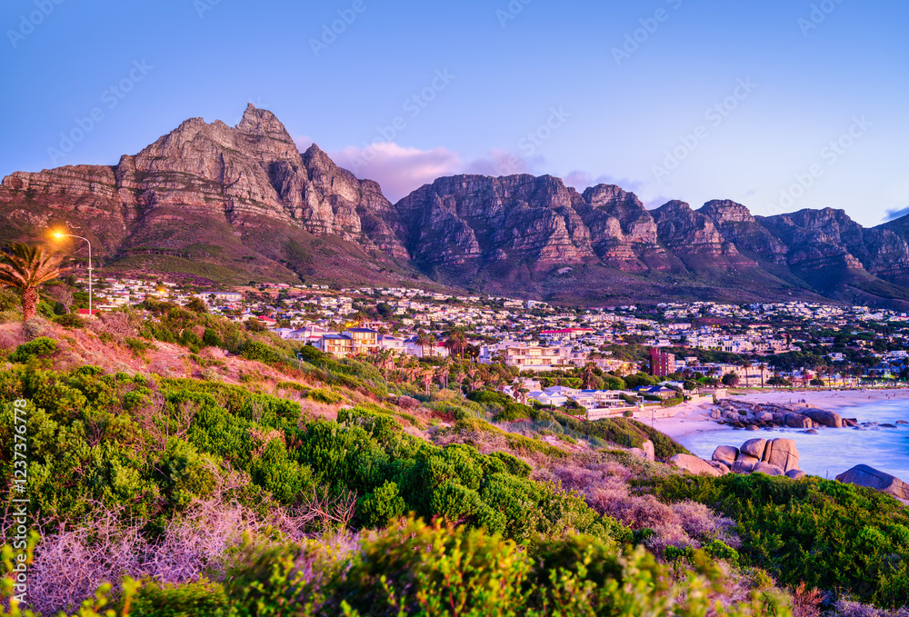 Long Exposure Shot of Camps Bay with Twelve Apostles Mountain at Maiden's Cove, Cape Town