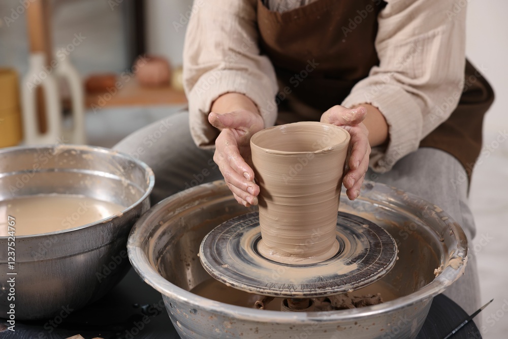 Hobby and craft. Woman making pottery indoors, closeup Hobby and craft. Woman making pottery indoors, closeup