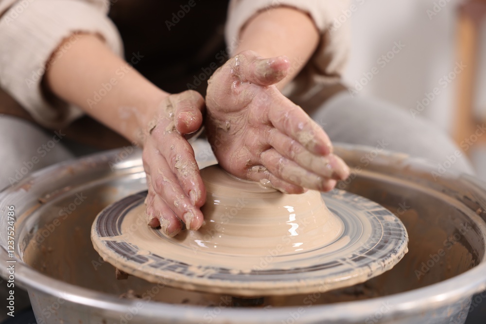 Hobby and craft. Woman making pottery indoors, closeup Hobby and craft. Woman making pottery indoors, closeup
