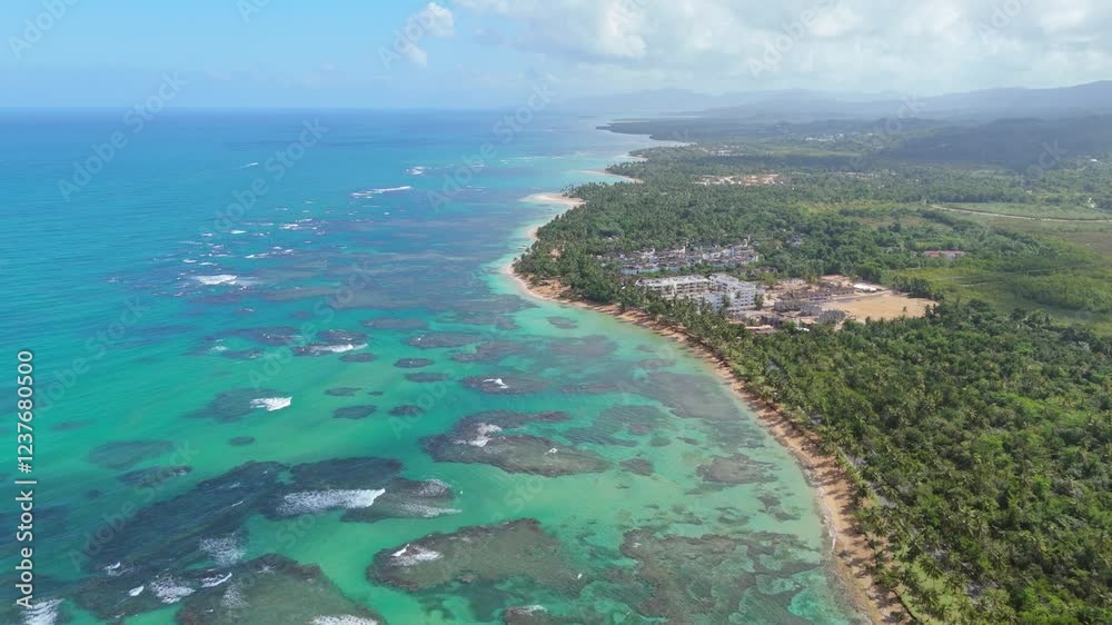 Caribbean coastline, Playa El Portillo, Las Terrenas in Dominican Republic. Aerial forward Caribbean coastline, Playa El Portillo, Las Terrenas in Dominican Republic. Aerial forward